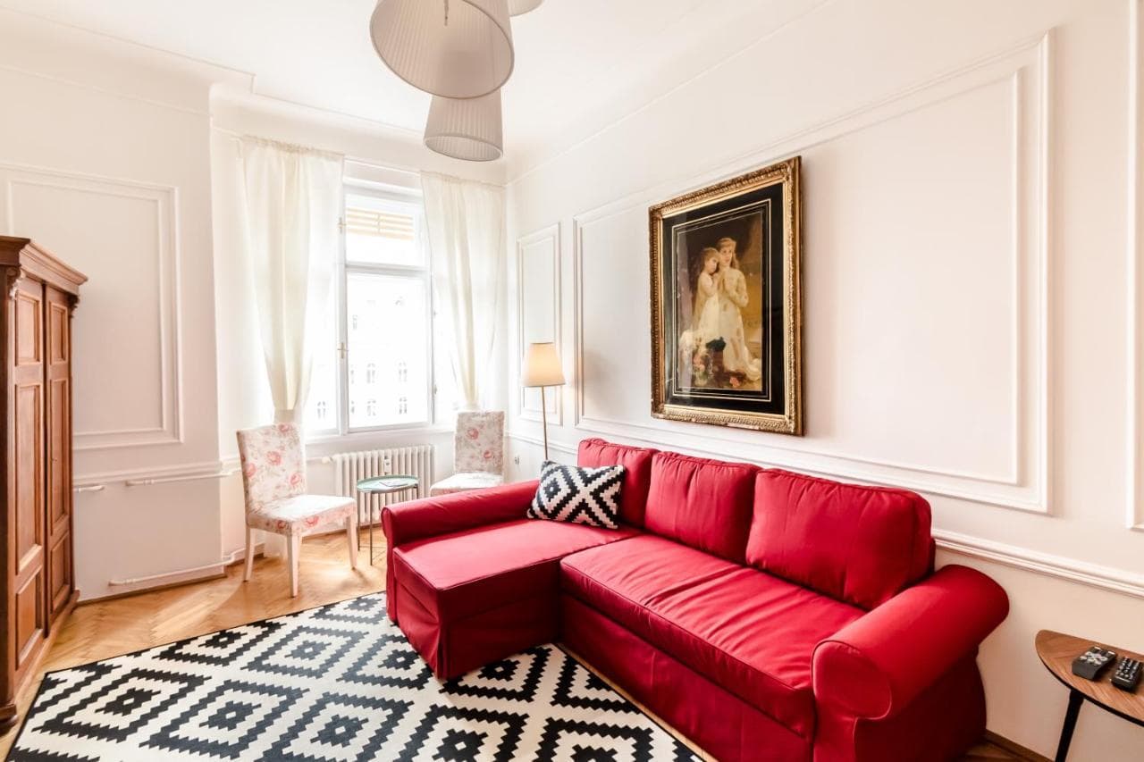 Golden Esthetic with Red Sofa Apartment