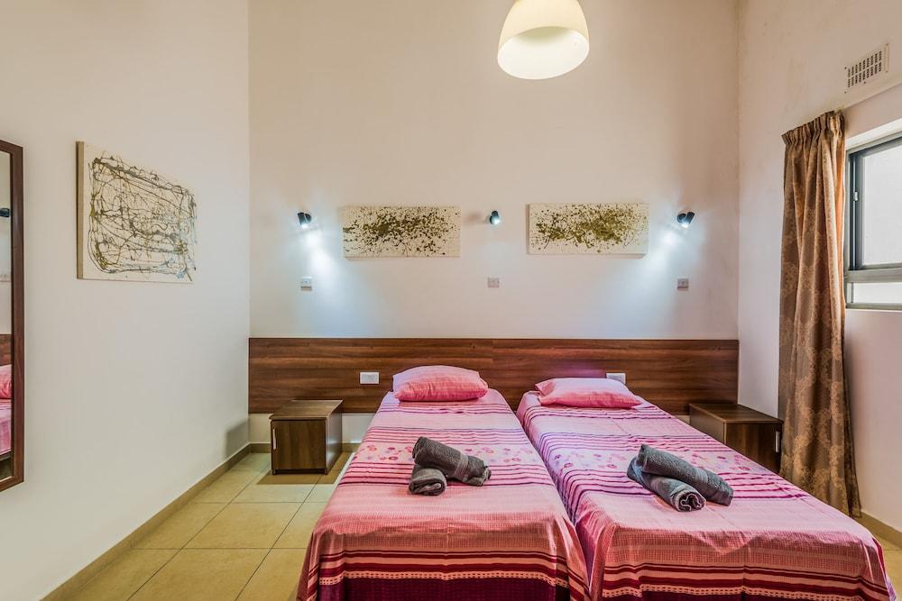 Summer Breeze Maisonette with Terrace by Getaways Malta 2