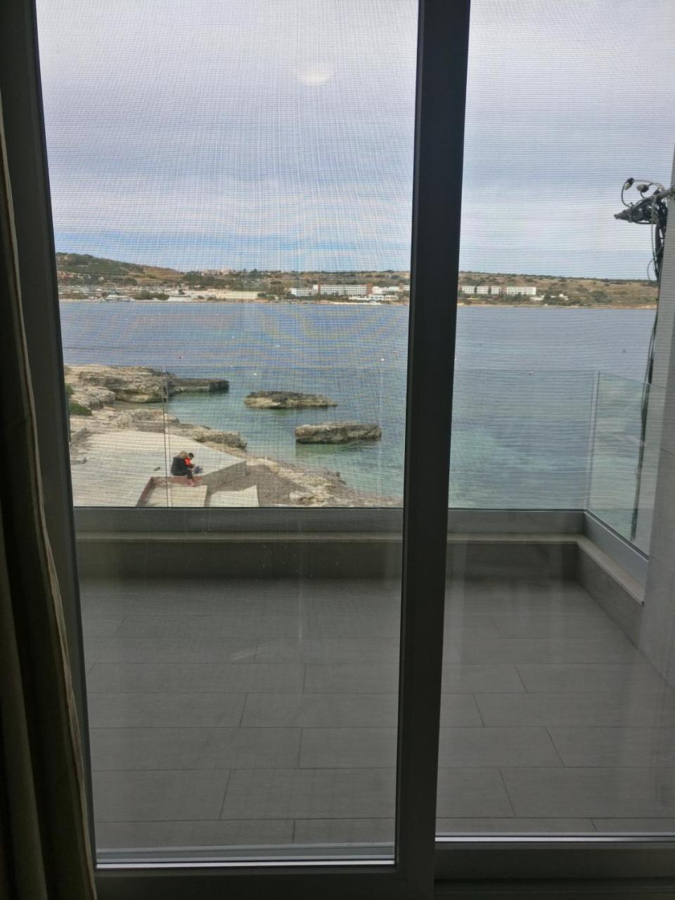 Beachfront with Seaviews Apartment No56 Award Winner Unbeatable Location for Closeness To the Sea Ideal for Guests Looking for Winter Spring And Autumn Breaks in Sunny Malta Also Ideal for Coastal Hikers 1