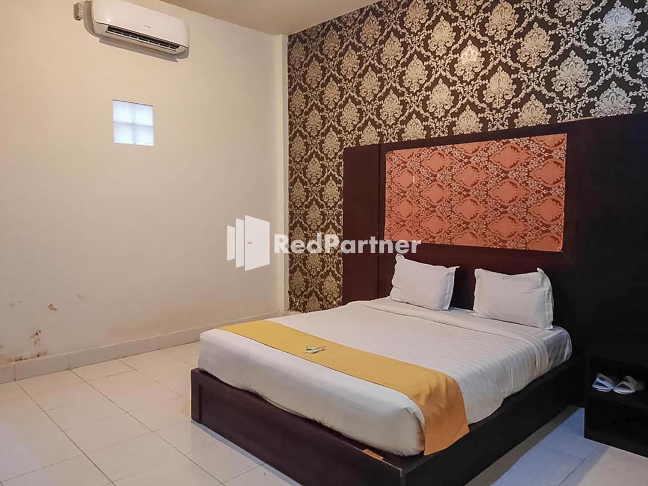 Hotel Puri Yasmin Potowanua Lasusua Mitra Reddoorz
