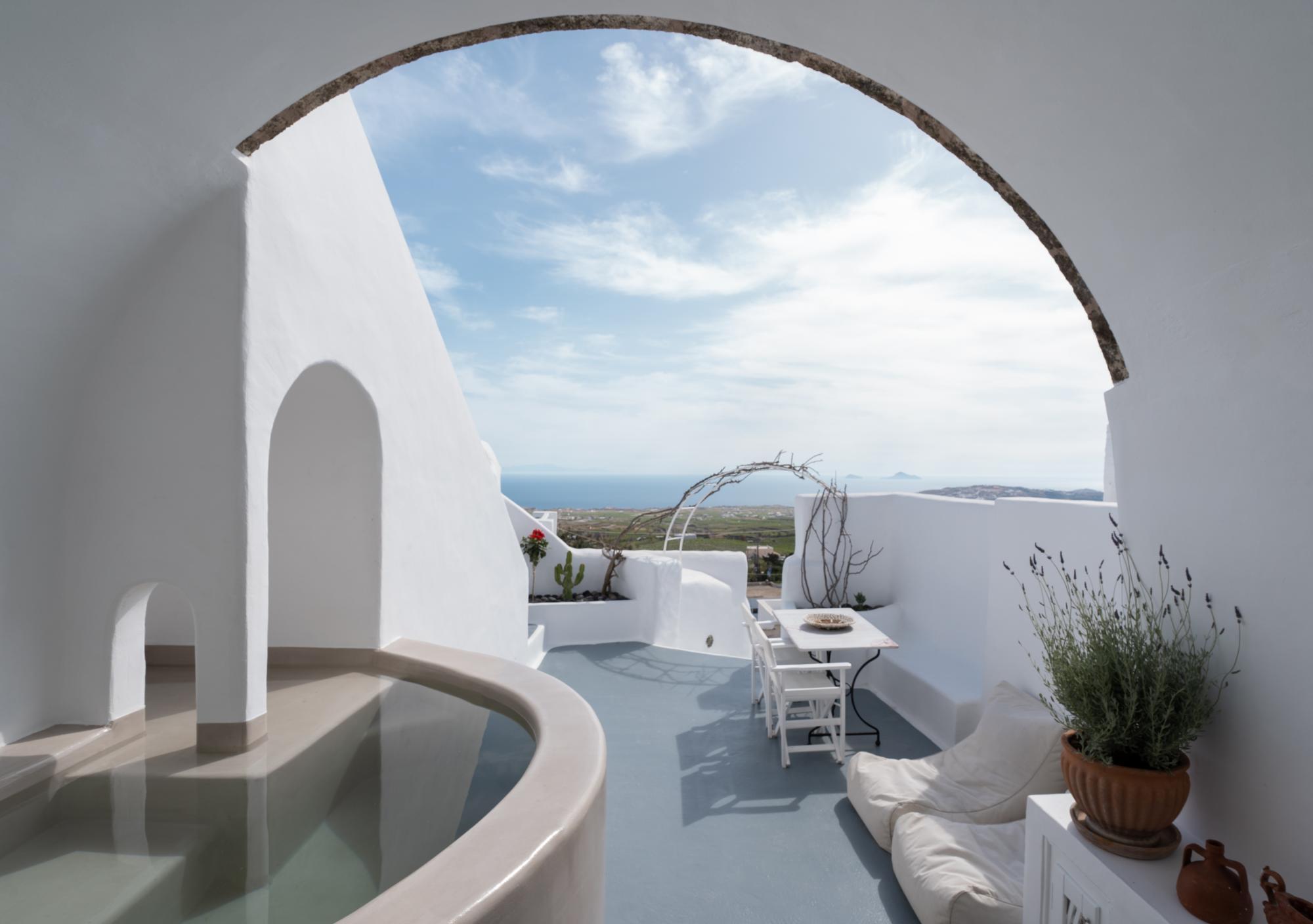 Traditional Cave Suite | Large Hot Tub | Sea View 1