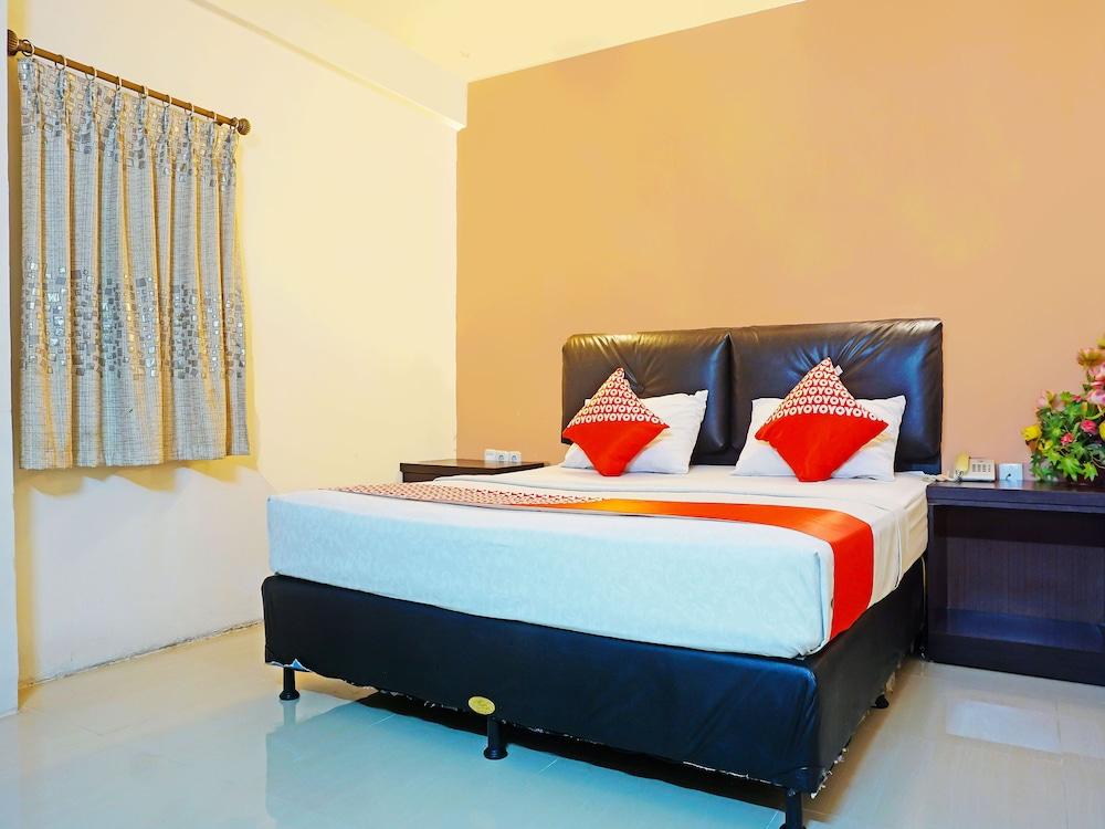 Collection O 91565 Hotel Grand Populer