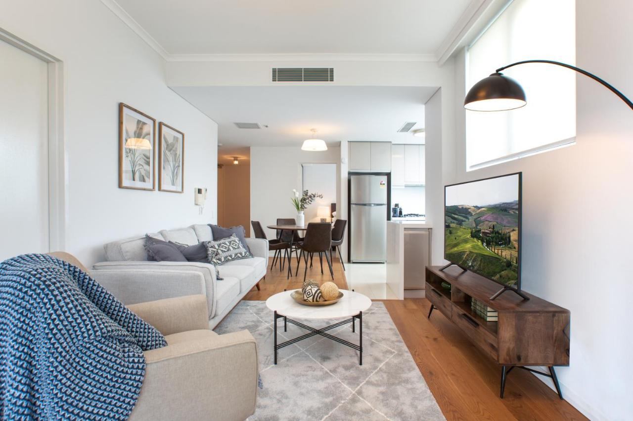 Modern Retreat with Balcony & Parking, Near Trains