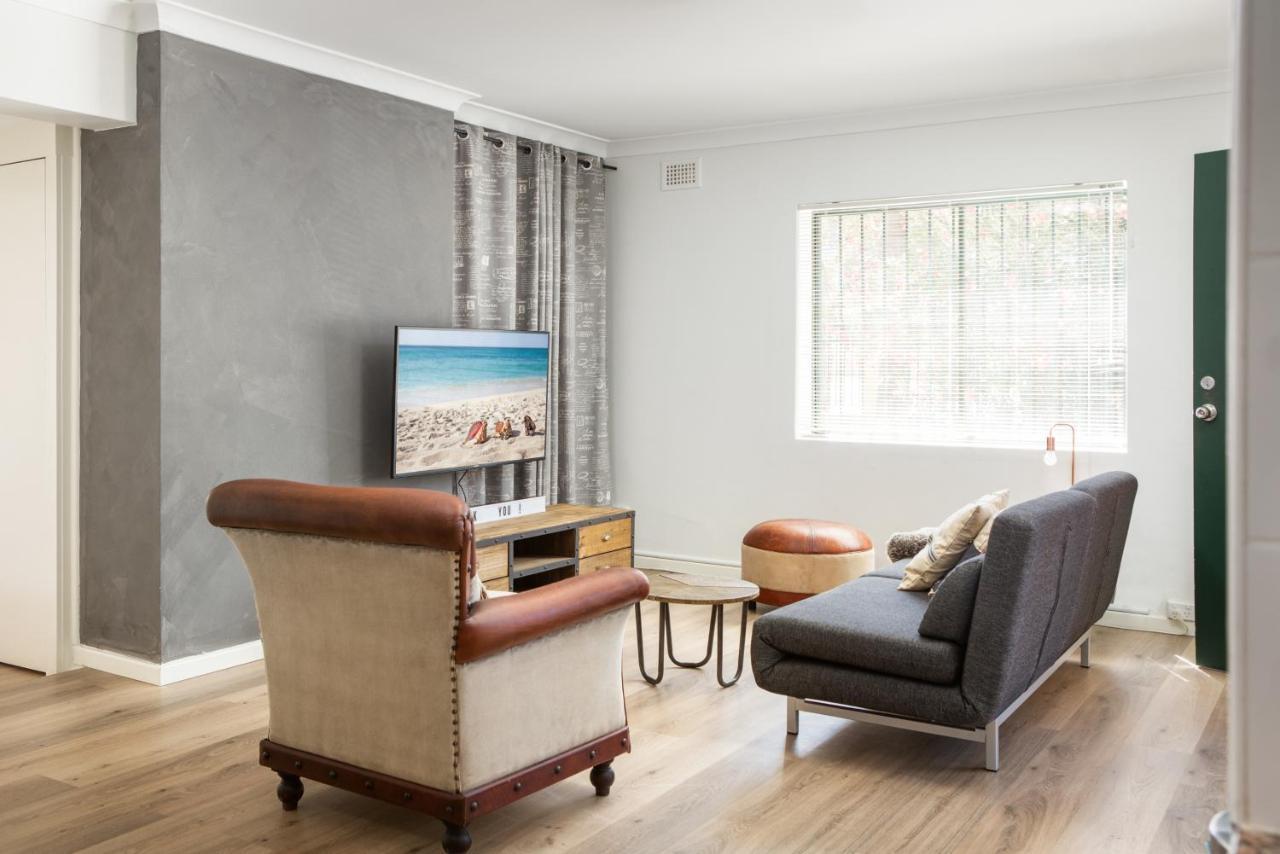 Suburban Two-Bed Apartment with Parking And Patio