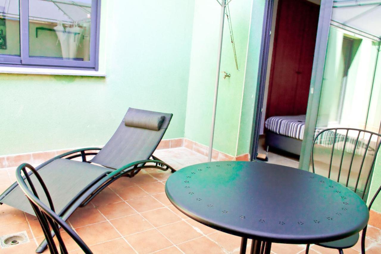 Urban Manesa City Center Apartment with Private Patio 1