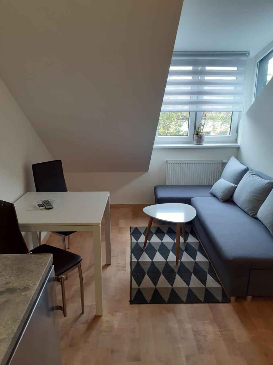 Attic Rooms at Laisves Avenue